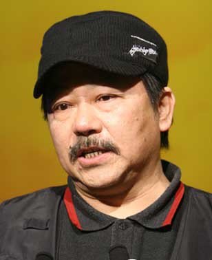 ţ