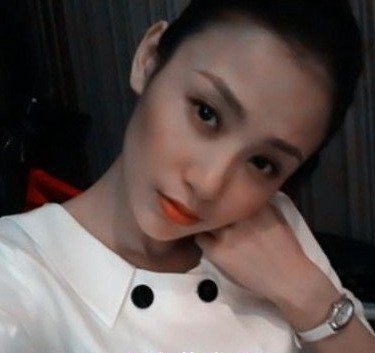 吴启华现任妻子石洋子个人资料以及照片