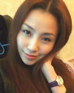 吴启华现任妻子石洋子个人资料以及照片