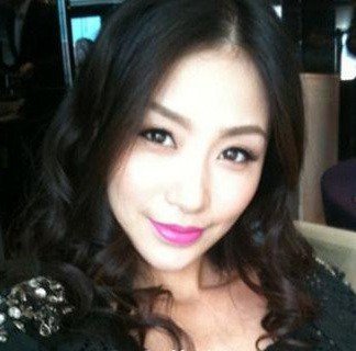 吴启华现任妻子石洋子个人资料以及照片