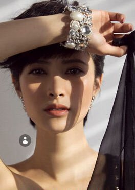 忡